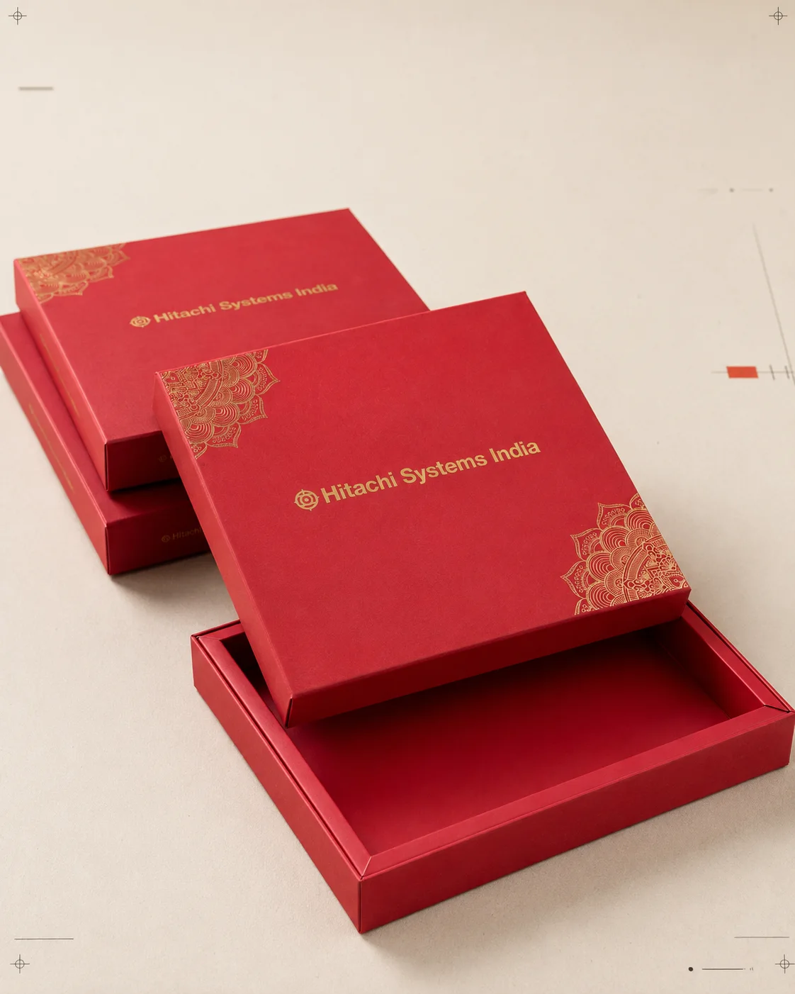 Red Hitachi Systems India rigid presentation boxes with gold printed details